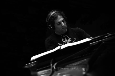Black and white photo of Michael Yezerski composing