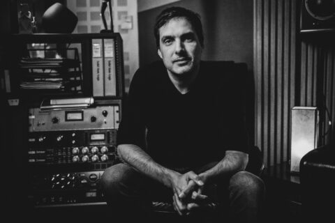 Black and white photo of Olivier Deriviere in his Paris studio
